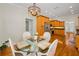 Bright living space featuring a breakfast nook near a modern kitchen at 5050 Limestone Dr, Port Richey, FL 34668