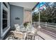 Inviting screened patio with a glass table and chairs, perfect for enjoying outdoor living at 5050 Limestone Dr, Port Richey, FL 34668