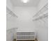 Walk-in closet includes shelving for storage and organization at 5050 Limestone Dr, Port Richey, FL 34668