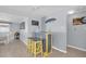 A custom bar area with seating for entertaining friends and Gathering with outdoor themed decor at 5061 Ensign Loop, New Port Richey, FL 34652
