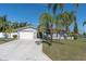 Charming single Gathering home with a well-manicured lawn and a two-car garage at 5061 Ensign Loop, New Port Richey, FL 34652
