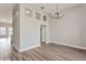 Spacious living area with high ceilings, modern lighting, and an open floor plan at 5357 Greystone Dr, Spring Hill, FL 34609