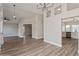 Bright, open-concept living room featuring light wood floors and an abundance of natural light at 5357 Greystone Dr, Spring Hill, FL 34609
