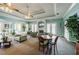 Lounge with comfortable seating, fireplace, and view, a cozy gathering space in the community at 5903 War Admiral Dr, Wesley Chapel, FL 33544