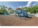 Community playground area featuring climbing structures, slides, and swings for active fun at 5903 War Admiral Dr, Wesley Chapel, FL 33544