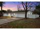 A well-kept home features an attached garage, a cozy yard, and a private fence at 6358 Dakota Dr, Brooksville, FL 34602