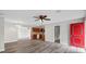 Open-concept living area featuring modern flooring, fresh paint, and a seamless flow to the kitchen at 6358 Dakota Dr, Brooksville, FL 34602