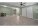 Expansive bedroom area with tile flooring, multiple closets, and natural light, ready for personalization at 646 Riverside Dr, Tarpon Springs, FL 34689