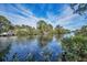 Scenic water view showcasing the canal's serene beauty and providing a tranquil outdoor setting at 646 Riverside Dr, Tarpon Springs, FL 34689