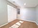 Bedroom featuring carpeted floors, neutral colored walls, a window allowing natural light, and a closet at 7104 Hummingbird Ln, New Port Richey, FL 34655