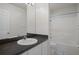 Bathroom with a large mirror, shower-tub combo, and a vanity at 7292 Sherman Hills Blvd, Brooksville, FL 34602