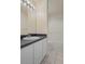 Clean bathroom with a large vanity, modern fixtures, and a shower-tub combination at 7292 Sherman Hills Blvd, Brooksville, FL 34602