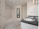 Bathroom featuring a dual sink vanity with shower and toilet at 7292 Sherman Hills Blvd, Brooksville, FL 34602