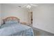 Bedroom with a bed, ceiling fan, and neutral wall color at 7292 Sherman Hills Blvd, Brooksville, FL 34602