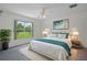 Serene bedroom with large window, neutral decor, and ample natural light at 7292 Sherman Hills Blvd, Brooksville, FL 34602