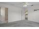 Bedroom leading to kitchen view featuring carpet flooring and white trim at 7292 Sherman Hills Blvd, Brooksville, FL 34602