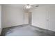 Spacious bedroom featuring light gray carpeting and a neutral color scheme throughout at 7292 Sherman Hills Blvd, Brooksville, FL 34602