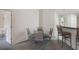 Bright dining area with a glass table set, carpeted floors, and white walls at 7292 Sherman Hills Blvd, Brooksville, FL 34602