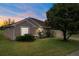 Charming single-story home with a well-manicured lawn, landscaped garden, and inviting curb appeal at 7292 Sherman Hills Blvd, Brooksville, FL 34602
