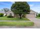 Charming single-story home with a well-manicured lawn and a two car garage with great curb appeal at 7292 Sherman Hills Blvd, Brooksville, FL 34602