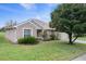 Charming home exterior with manicured landscaping and a lush front yard at 7292 Sherman Hills Blvd, Brooksville, FL 34602