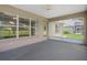 Enjoy indoor/outdoor living on the screened lanai with tranquil views of the lush landscape at 7292 Sherman Hills Blvd, Brooksville, FL 34602