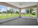 The screened lanai offers serene golf course views, seamlessly blending indoor and outdoor living at 7292 Sherman Hills Blvd, Brooksville, FL 34602