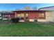 Cozy backyard with well-maintained lawn and exterior view of the home at 7523 Greystone Dr # 35, Hudson, FL 34667