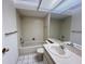 A standard bathroom featuring a tub and shower combo at 7523 Greystone Dr # 35, Hudson, FL 34667