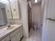 Standard bathroom featuring a sink, vanity, and shower at 7523 Greystone Dr # 35, Hudson, FL 34667