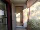 View of the home's side entry and foyer, showcasing an inviting entrance with natural light and a storage area at 7523 Greystone Dr # 35, Hudson, FL 34667