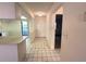 Bright entryway with tiled floors leading into the home's living spaces at 7523 Greystone Dr # 35, Hudson, FL 34667