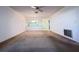 Spacious living room awaiting personalization, with ample natural light and an open layout at 7523 Greystone Dr # 35, Hudson, FL 34667