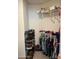 Walk-in closet with shelving, hanging rods and shoe rack for optimal storage solutions at 7715 Chasco St, Port Richey, FL 34668