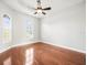 Bright bedroom with hardwood floors and large windows, lots of natural light at 10188 Whisper Ridge Trail Trl, Weeki Wachee, FL 34613