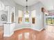 Eat-in kitchen area with view to the pool and backyard at 10188 Whisper Ridge Trail Trl, Weeki Wachee, FL 34613