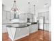 Well-appointed kitchen with stainless steel appliances and plenty of counter space at 10188 Whisper Ridge Trail Trl, Weeki Wachee, FL 34613