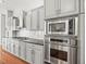Modern kitchen with granite countertops and stainless steel appliances, great cabinetry at 10188 Whisper Ridge Trail Trl, Weeki Wachee, FL 34613