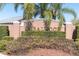 Elegant community sign for Sabalwood surrounded by lush landscaping at 11700 Leda Ln, New Port Richey, FL 34654