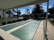Community shuffleboard court under a shaded canopy at 12027 Hoosier Ct # 104, Hudson, FL 34667
