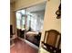 A bright sunroom with sliding glass doors, leading to outdoor space at 12027 Hoosier Ct # 104, Hudson, FL 34667