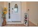Charming front door with decorative glass and a welcoming entryway at 13032 Pinnacle Ln, Hudson, FL 34669