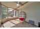 Relaxing sunroom with tile floors and comfortable seating, ideal for enjoying peaceful afternoons in a well-lit space at 13032 Pinnacle Ln, Hudson, FL 34669
