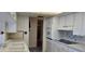 The kitchen has an oven and sink at 1414 Grand Blvd, Holiday, FL 34690