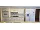 The kitchen has a refrigerator and sink at 1414 Grand Blvd, Holiday, FL 34690