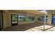 Enclosed patio featuring large windows and outdoor views at 1414 Grand Blvd, Holiday, FL 34690
