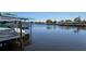 Wide canal with room for multiple boats and boat lifts at 1414 Grand Blvd, Holiday, FL 34690