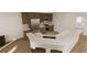 Spacious kitchen with a breakfast bar and stainless steel appliances at 5015 Us Highway 19 # 106, New Port Richey, FL 34652