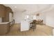 Bright kitchen with breakfast bar island that opens to a dining area at 5015 Us Highway 19 # 106, New Port Richey, FL 34652