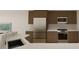 New kitchen with stainless appliances and contrasting cabinets at 5015 Us Highway 19 # 106, New Port Richey, FL 34652
